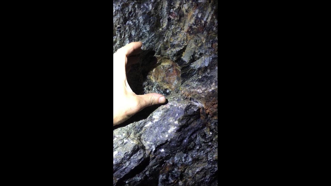 Mining for large Almandine at the Little Pine mine in