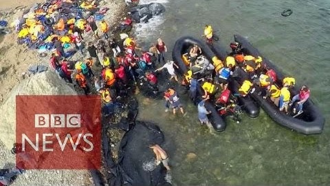 Drone video shows migrants