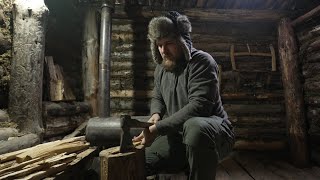 atmospheric overnight in cozy dugout , hot wood stove , bushcraft
