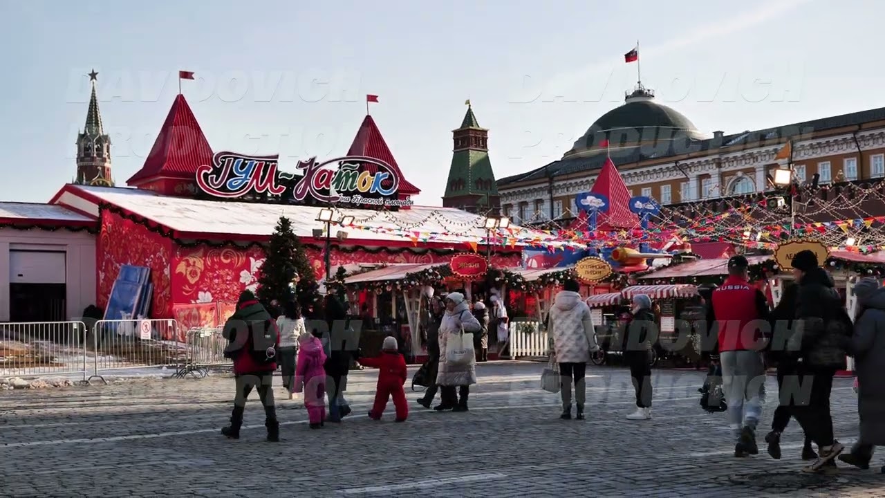 Moscow, Russia - Febrary 25, 2025: Tourists walking and shopping at the Christmas market in Red