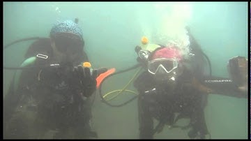 scuba diving egg trick in Pasir Putih, Situbondo, East Java