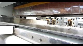Front feeding computer panel saw.