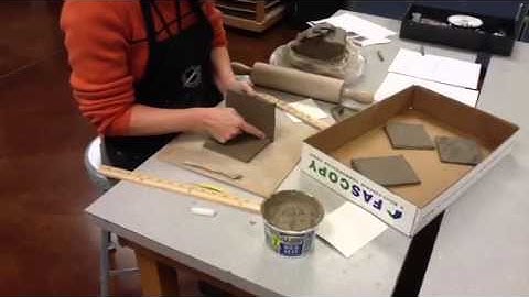 Putting clay slab box together