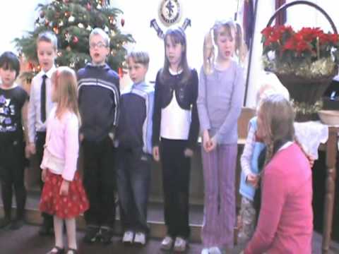 Away in a Manger children sing the Christmas carol