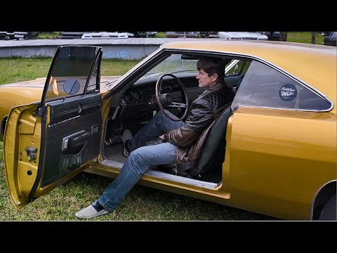 Video: Hvordan åbner du gastanken på en Dodge Charger?