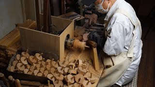 The process of making a Japanese spinning top. Traditional toy handed down from 1,300 years ago.