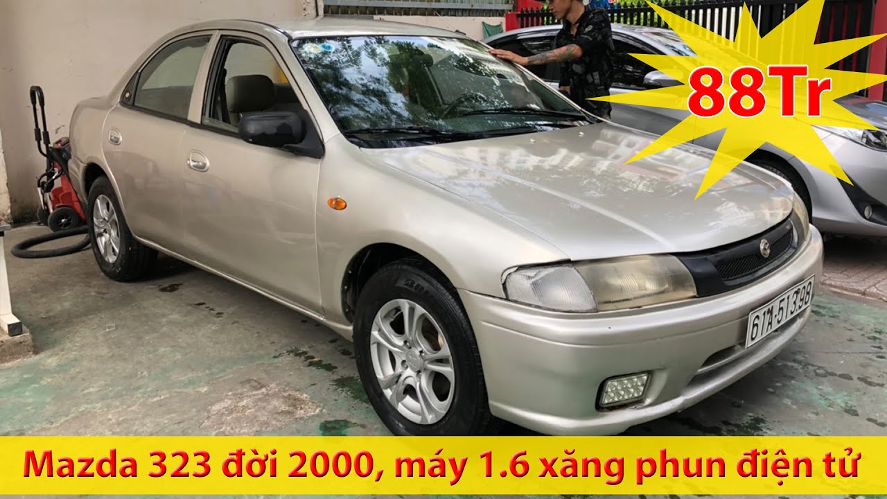 Mazda 323 2000  Cần bán lại xe Mazda 323 đời 2000 màu xanh lam