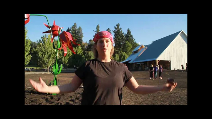 Cheryl Garcia installs red lily at Red Lily