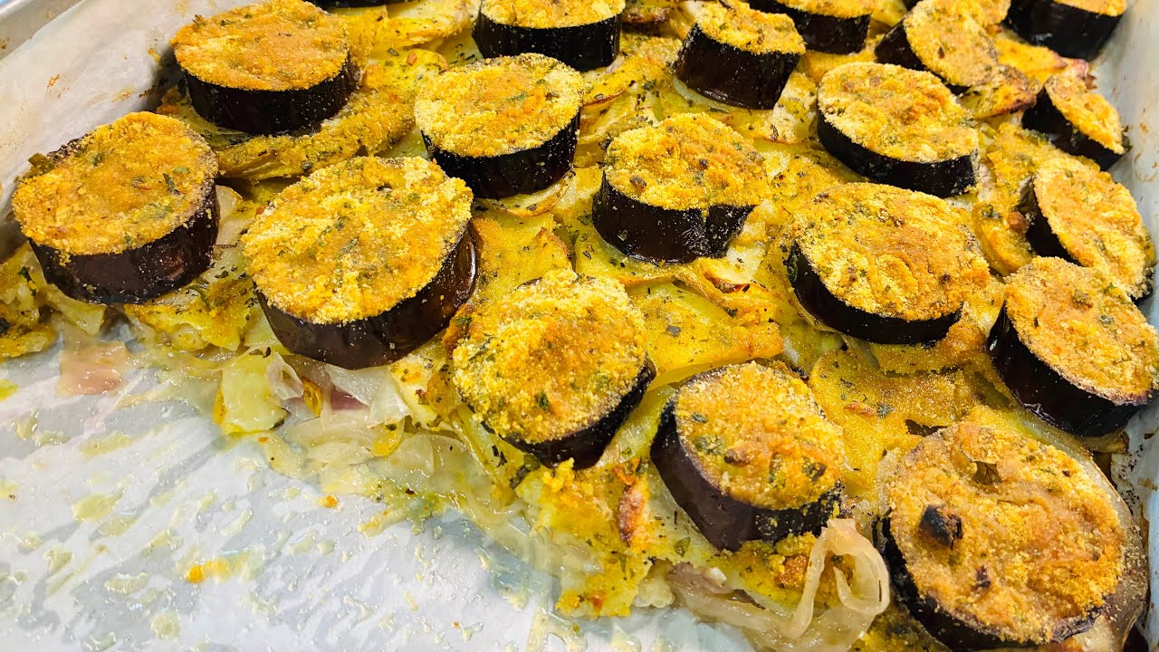 Melanzane su letto di cipolle e patate