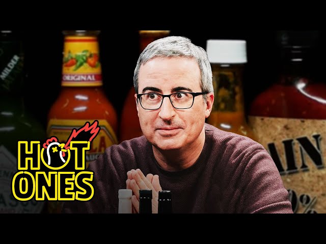 John Oliver Fears For Humanity While Eating Spicy Wings | Hot Ones class=