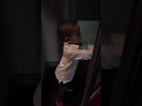 My Grandson Helping With A Luggage Cart