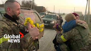 Kherson villagers cheer, give flowers as Ukrainian soldiers arrive after Russian withdrawal