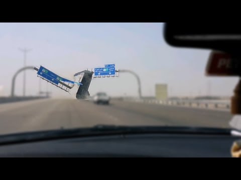 Truck's Trailer Crashes Into Highway Sign