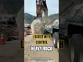 Heavy Rock Loading With Grapple Crane Control