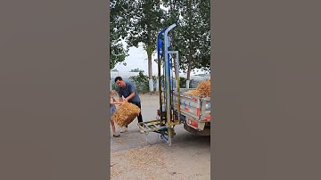 24V bale lifter loading bales while walking