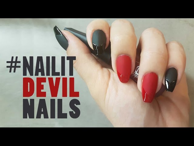 A Red Devil Hand With Black Nails Stock Photo, Picture and Royalty Free  Image. Image 12900675.