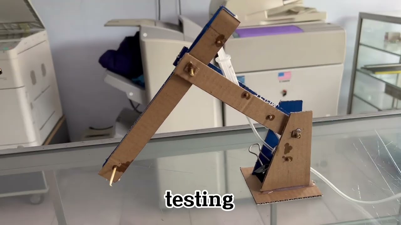 Praktikum fisika membuat robot hidrolik