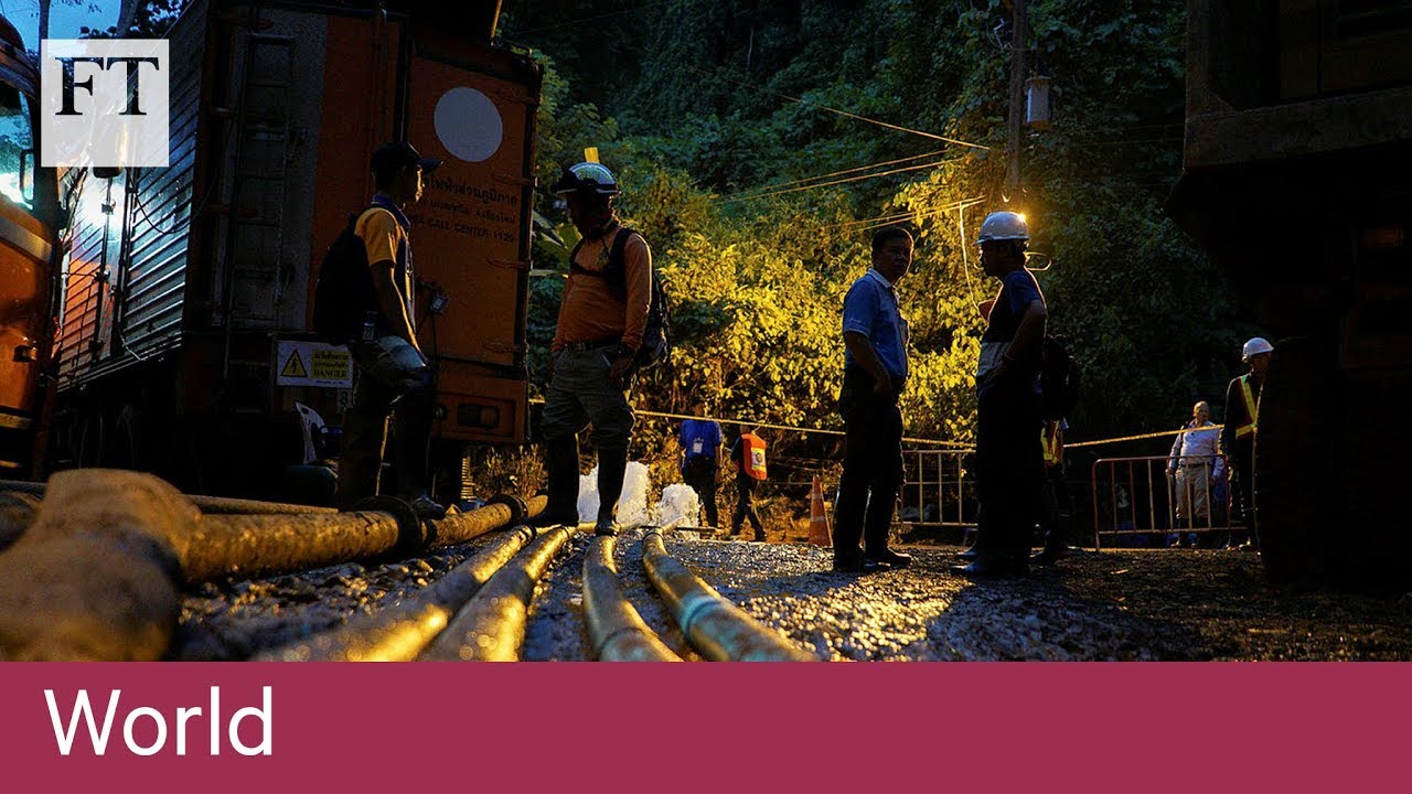 Film backdrop image for Rescuers seek ways to free trapped boys in Thai cave (2018)