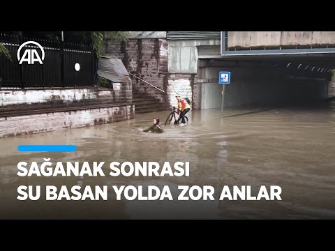 Ankara'daki sağanak sonrası bir kadın su basan yolda zor anlar yaşadı