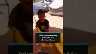 Palestinian child tearfully destroys his kites after Israel threatens military aggression