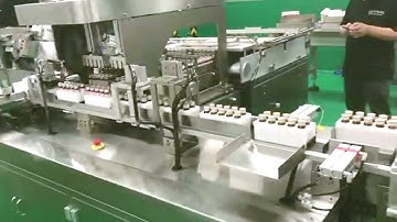 vial bottles feeding cartoning machine robot feeder cartoner equipment vertical type