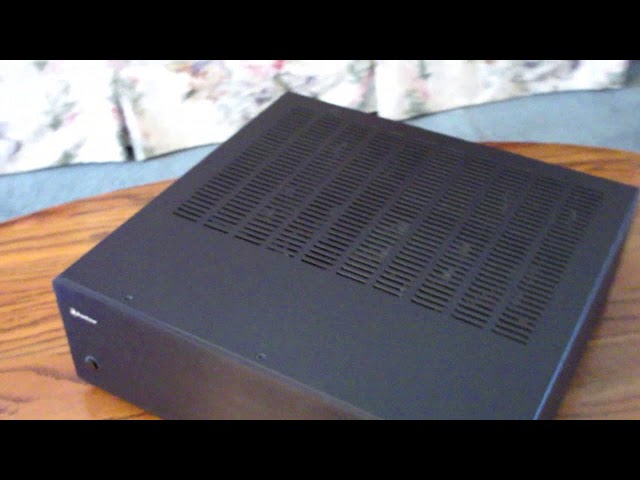 Outlaw audio Model 5000 amplifier review class=