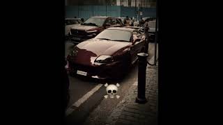 Just A Regular Coffee With A Red Car In Front Of It