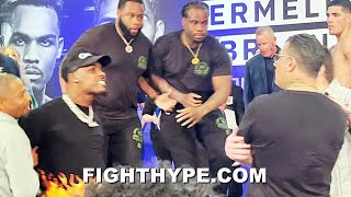 (2ND ANGLE) JERMALL CHARLO NEAR BRAWL WITH CASTANO MANAGER; RESTRAINED BEFORE ALL HELL BREAKS LOOSE