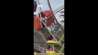 Two girls hospitalized after being thrown from Ferris wheel
