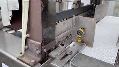 BID ON EQUIPMENT: Item 375672 - PMI Automatic Shrink Wrapper and Tunnel