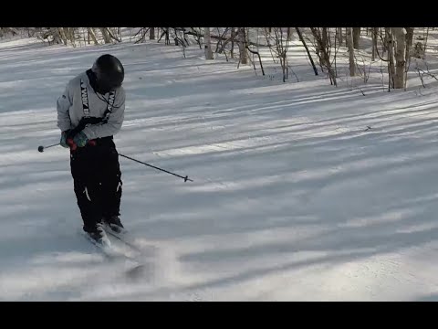 How to do sliding 360&rsquo;s down the hill on skis