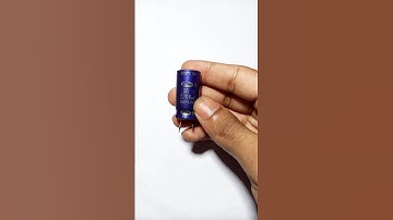 Lighting an LED light by charging a capacitor. #shorts