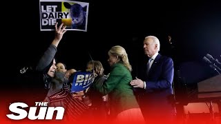 Protesters rush stage stopping Joe Biden's Super Tuesday victory speech