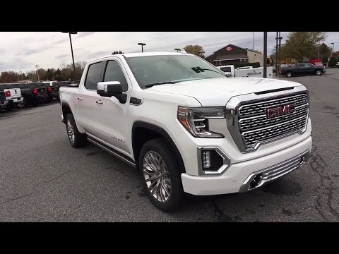 Video: Hvor er VIN-nummeret på en GMC Sierra?