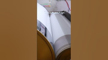 Label jumbo roll undergoing coating #label #sailing #material #workshop