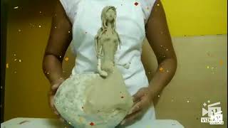 Beautiful angel flower vase with the use of newspaper mache and tissue paper