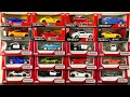 Box full of model car jaguar nissan audi maserati peugeot volvo renault subaru lexus 05