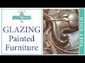 Glazing painted furniture with an antique soft gold Glazing painted furniture with an antique soft gold