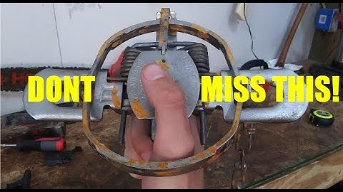How to adjust the pan tension on a foothold trap.