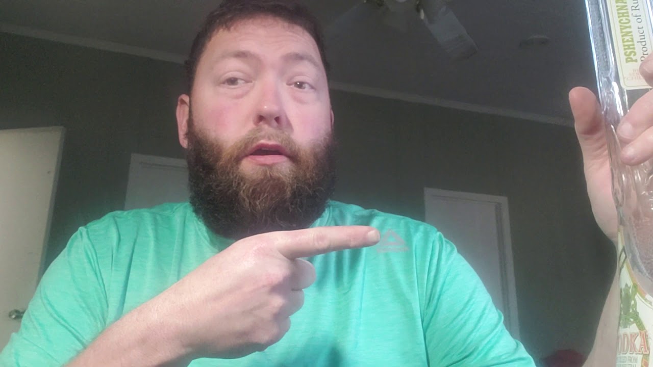 Homemade bong using a shotgun vodka bottle.