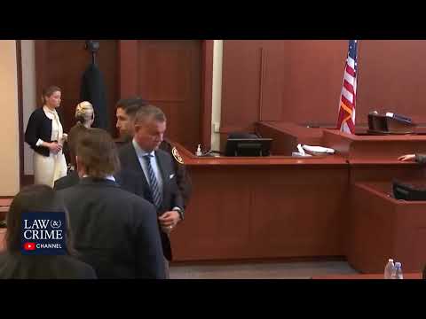 Johnny depp and Amber Heard almost run into each other in court