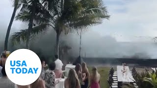Giant waves in Hawaii crash the party during wedding reception | USA TODAY