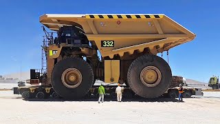 Towing Large Vehicles Cat 797B - Cat 794 AC Truck & Cat 854K Wheel Dozer