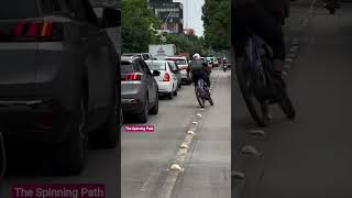 Cyclist Splits Traffic on Centerline Dividers | High Risk Commute Tips