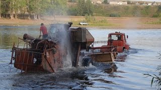 Tractor T-150K pulls Harvester SK-5 Niva through a deep river. Dangerous crossing!(, 2013-10-23T15:09:13.000Z)