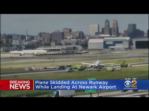 Plane Skids Off Runway In Newark