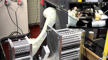 Kawasaki R Series robot machine loading