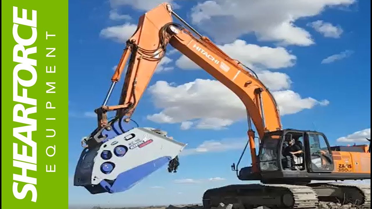 Xcentric XC40 Crusher Bucket At Work Crushing Concrete in Calgary