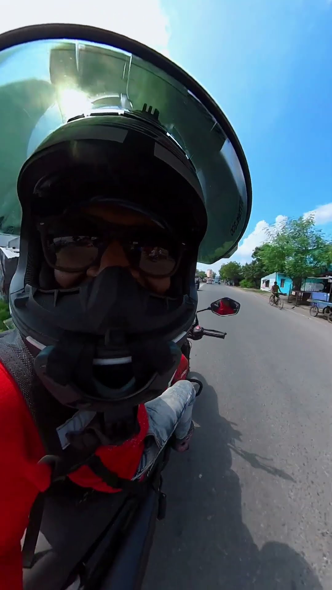 Rider Avoids Dogs Crossing Road with Quick Maneuver