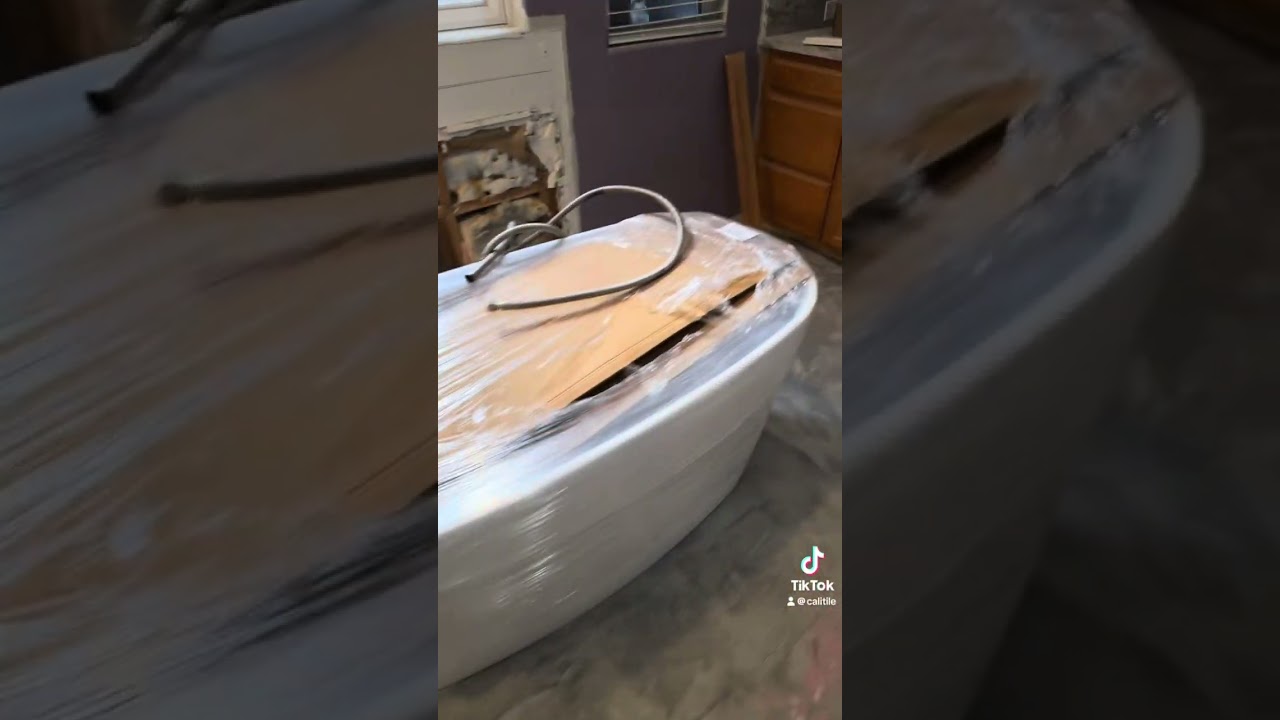 Wood look tile flooring going in 